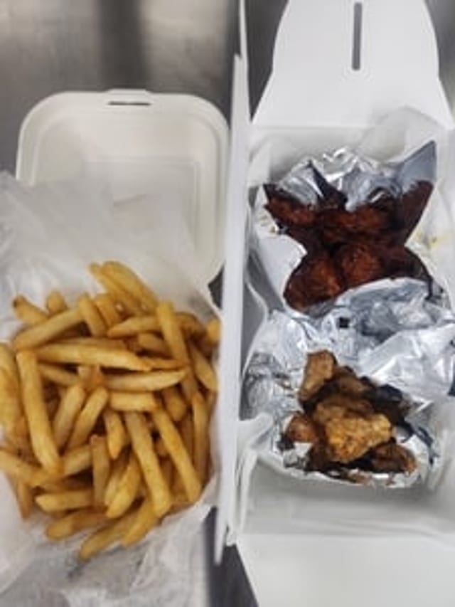 9 PC Boneless Wings with Fries.